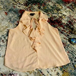 Very sleek blouses, peach color